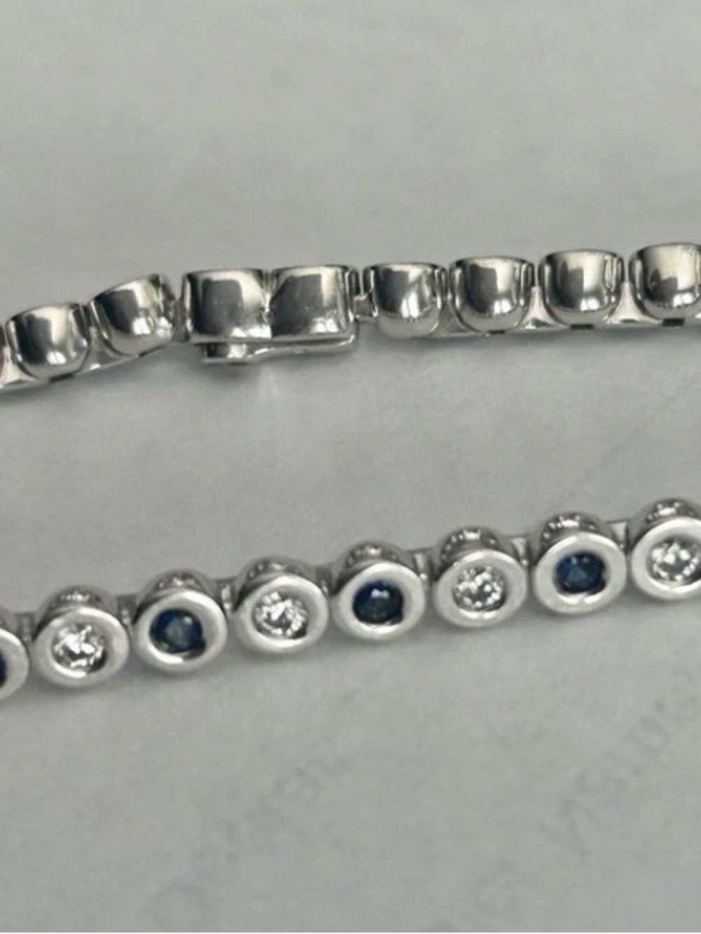 Movado 18kw bracelet 1 carat of diamonds and natural sapphires.